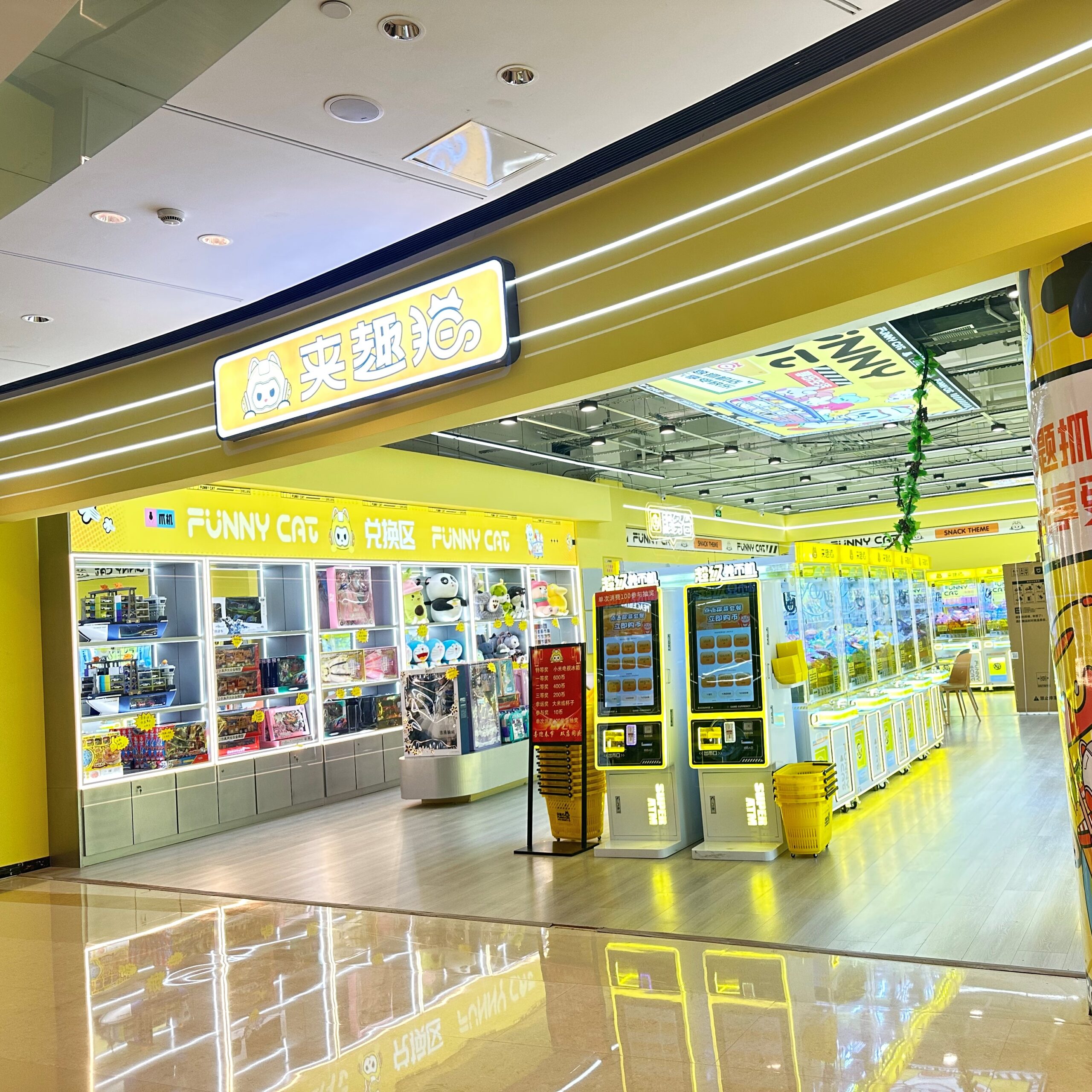Chengjietian Gen 2 claw machines displayed in a shopping mall arcade area, highlighting the upgraded cabinet design and stable performance.