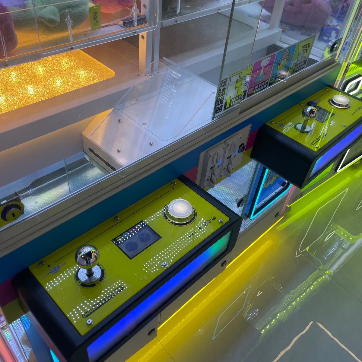 Dual-player claw machine player control panel display