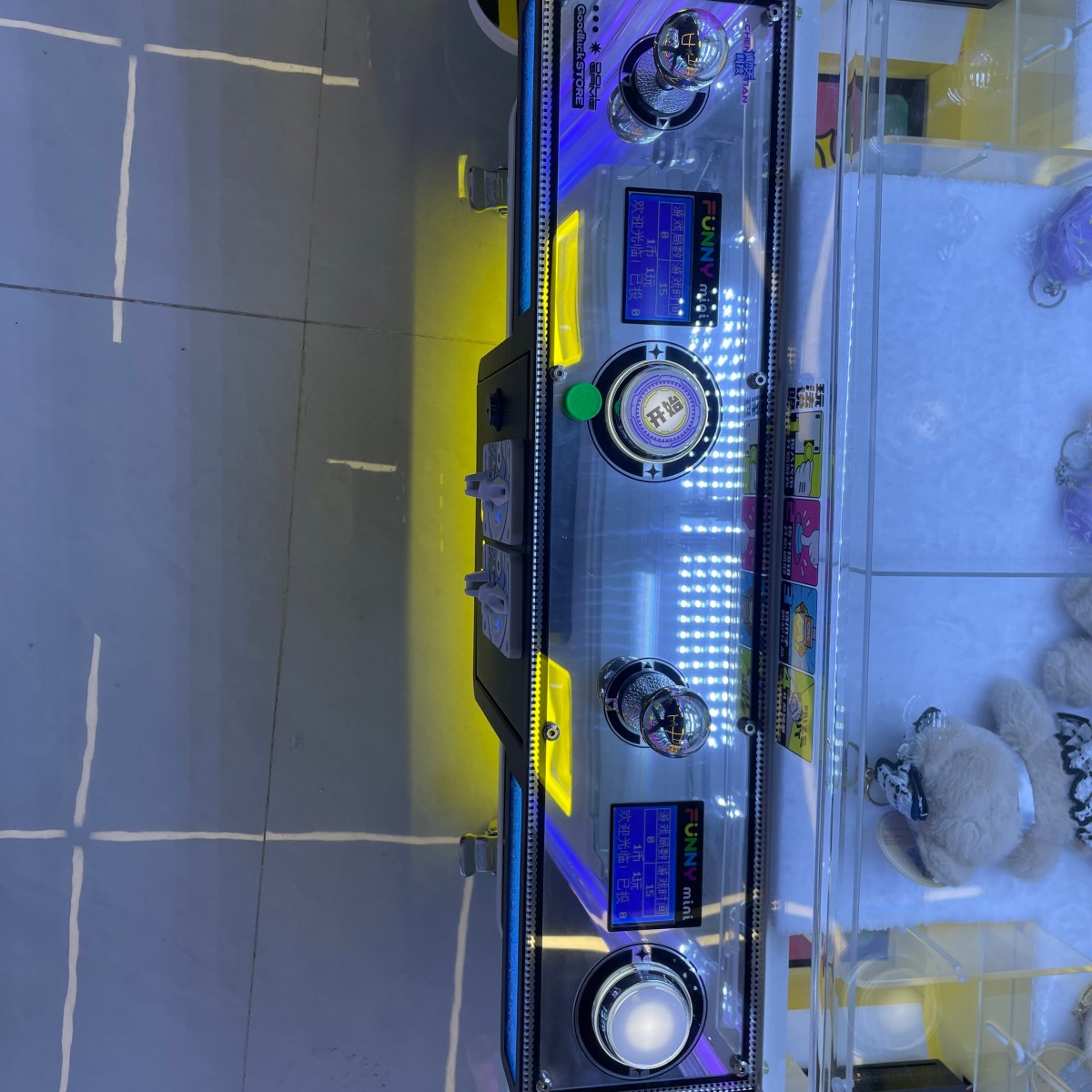 Dual-player control panel on Gen 4 mini claw machine designed for two-player interactive gameplay