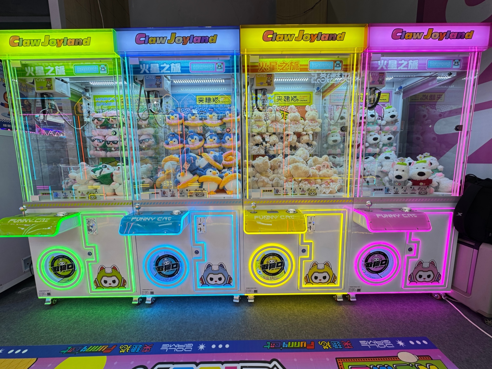 Chengjietian Gen 2 claw machines installed in a commercial arcade, showcasing high-traffic layout and LED-enhanced attraction