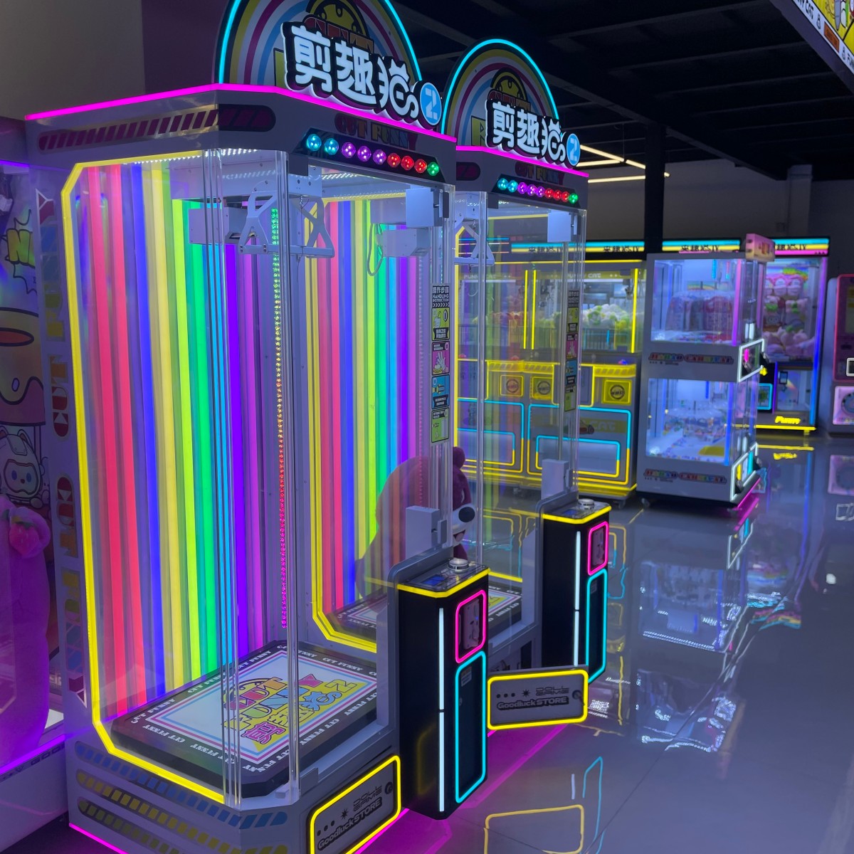 Gen 2 Scissor Gift Machines installed in arcade venue, commercial scissors prize machines lineup for entertainment centers