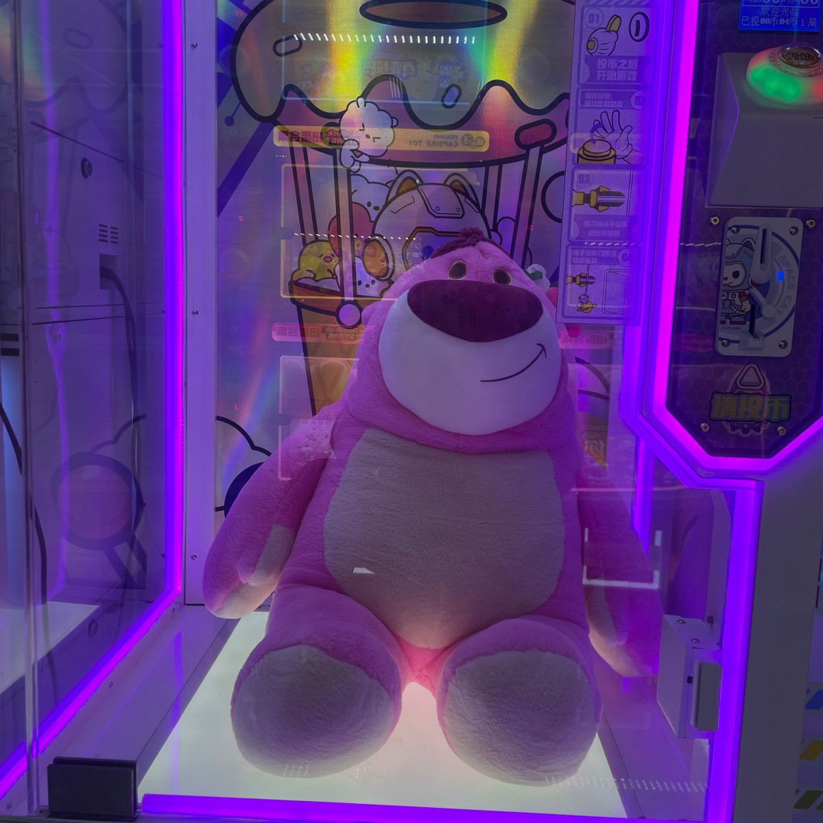 Inside view of Gen 1 Scissor Gift Machine with hanging prize