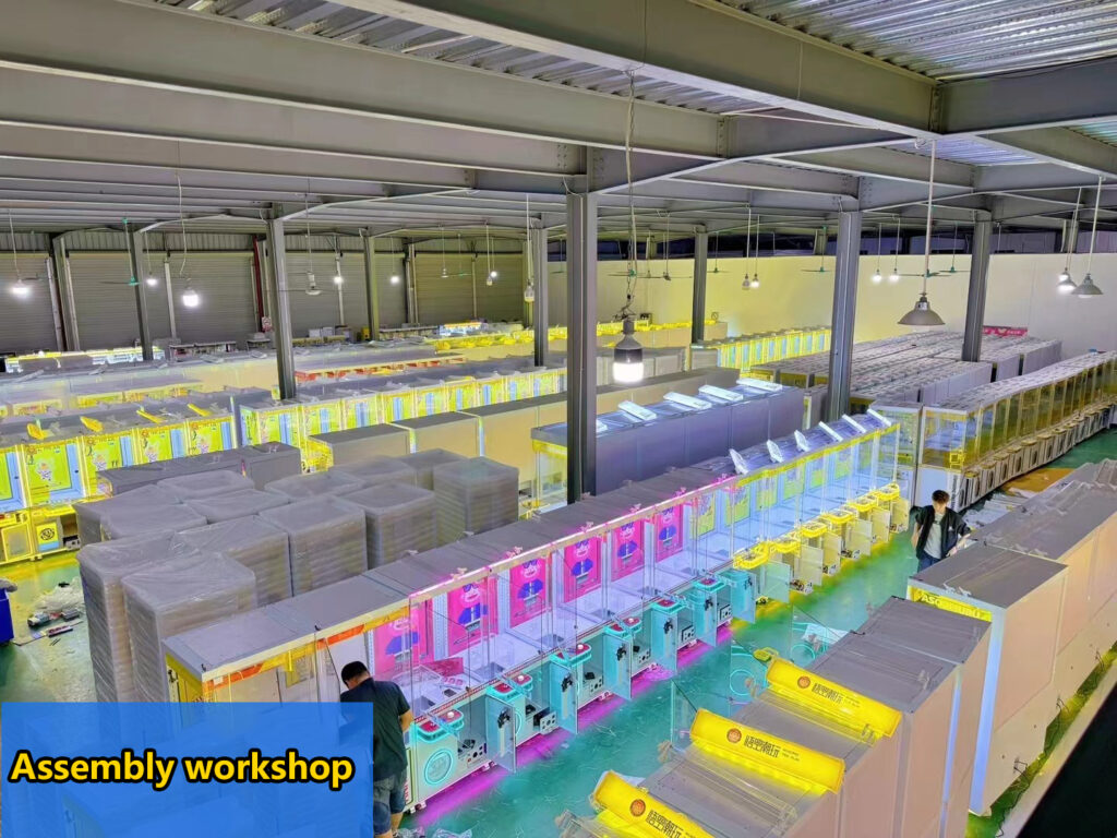 Overhead view of the assembly workshop, displaying the production process and machine assembly stations.