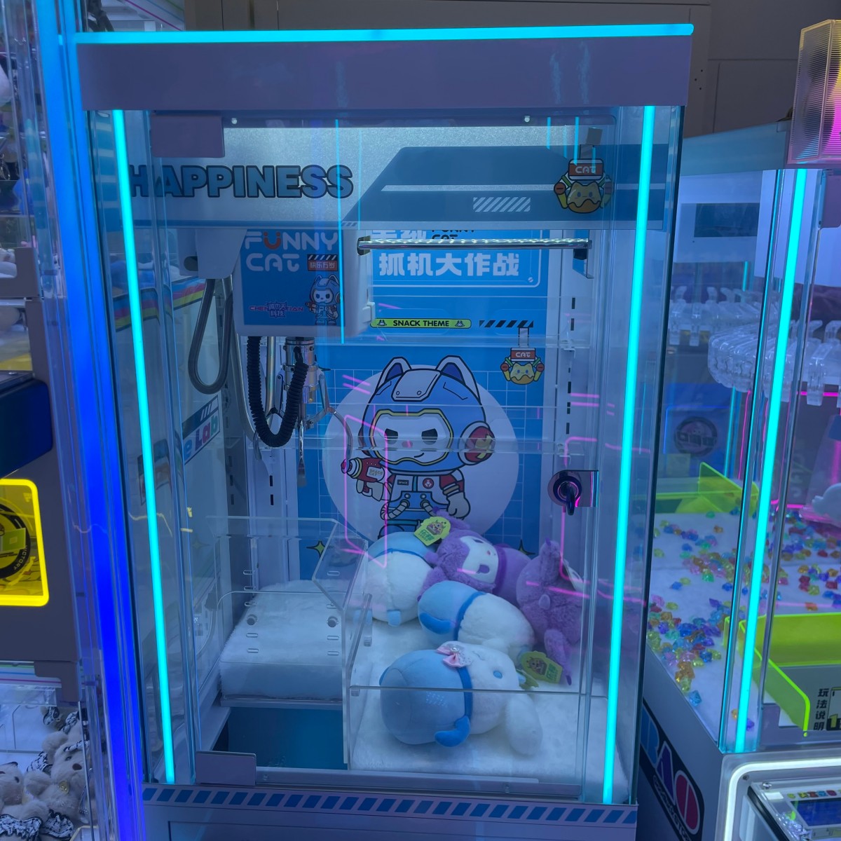 Upper cabinet with LED lighting on small size commercial claw machine